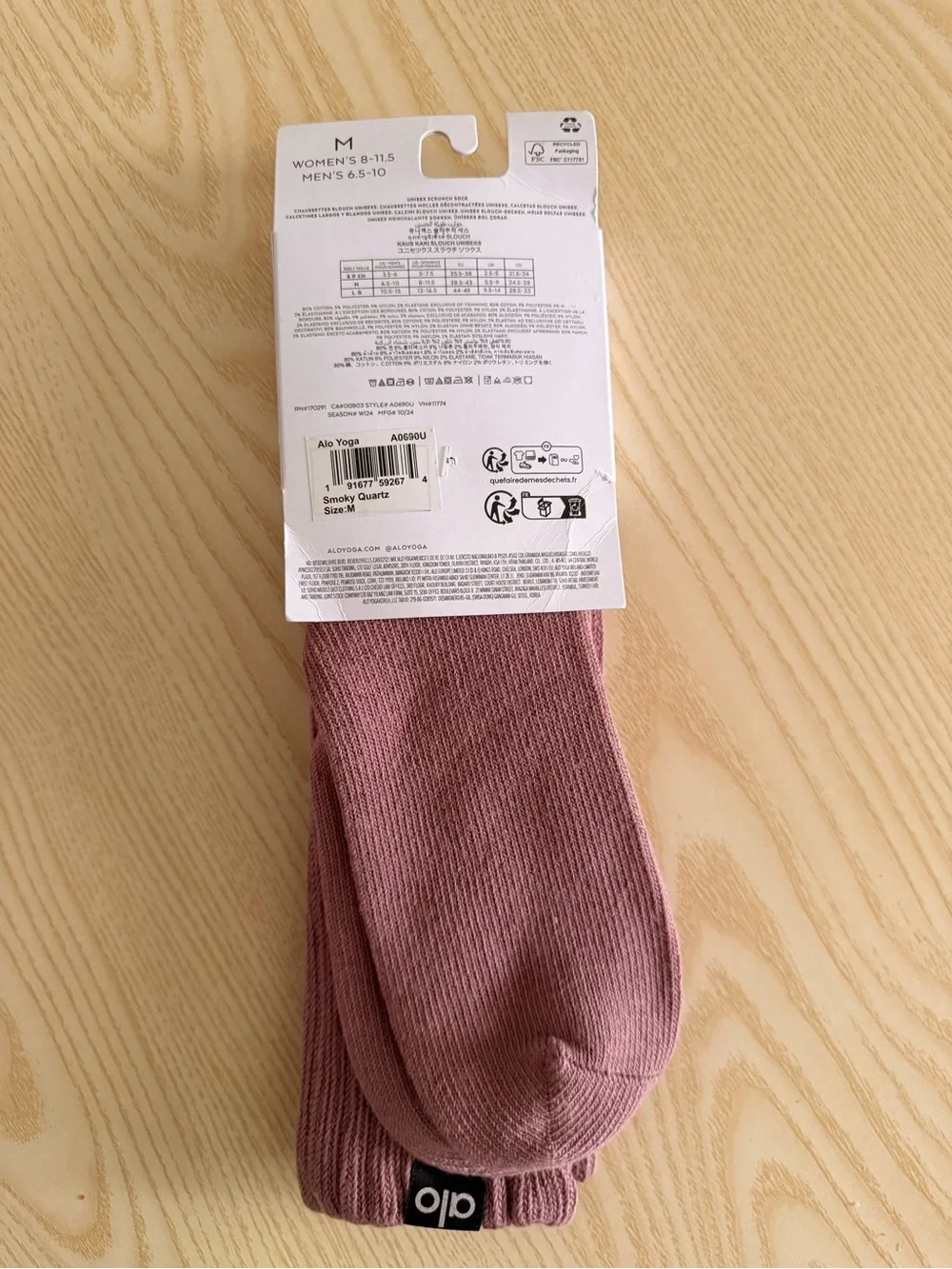 Alo Yoga Unisex Scrunch Socks in a ribbed, mauve-colored knit.